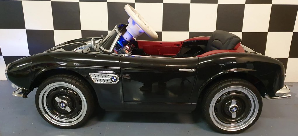 Carro elétrico infantil  para crianças 3 a 6 anos BMW 507 12 volts Pneus Borracha e controlo remoto 2.4G e arranque lento Preto