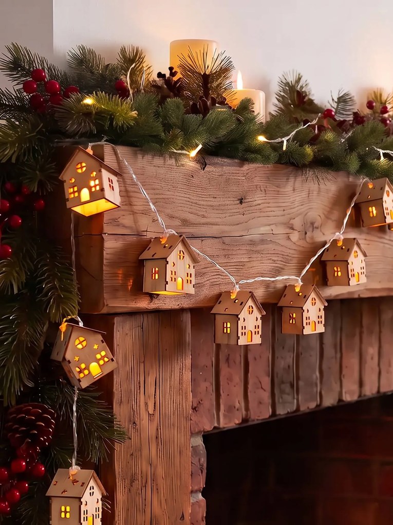 Grinalda luminosa de casas em madeira bege