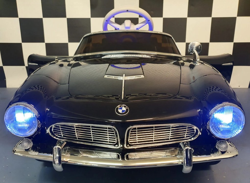 Carro elétrico infantil  para crianças 3 a 6 anos BMW 507 12 volts Pneus Borracha e controlo remoto 2.4G e arranque lento Preto