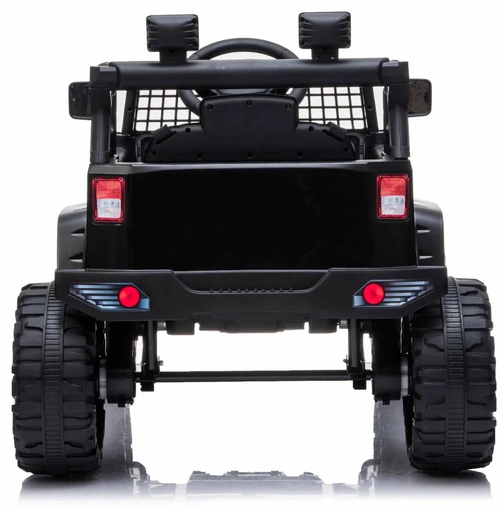 Carro elétrico Crianças OFFROAD com tração traseira, preto, bateria 12V, chassi alto, assento largo, eixos suspensos, controle remoto 2,4 GHz, MP3 pla