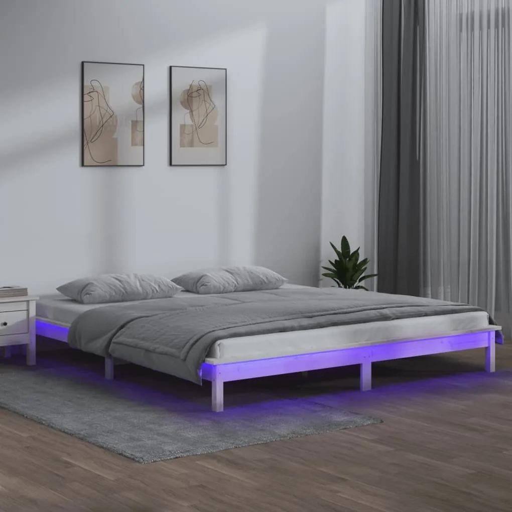 Estrutura de cama com luzes LEDs 140x200 madeira maciça branco