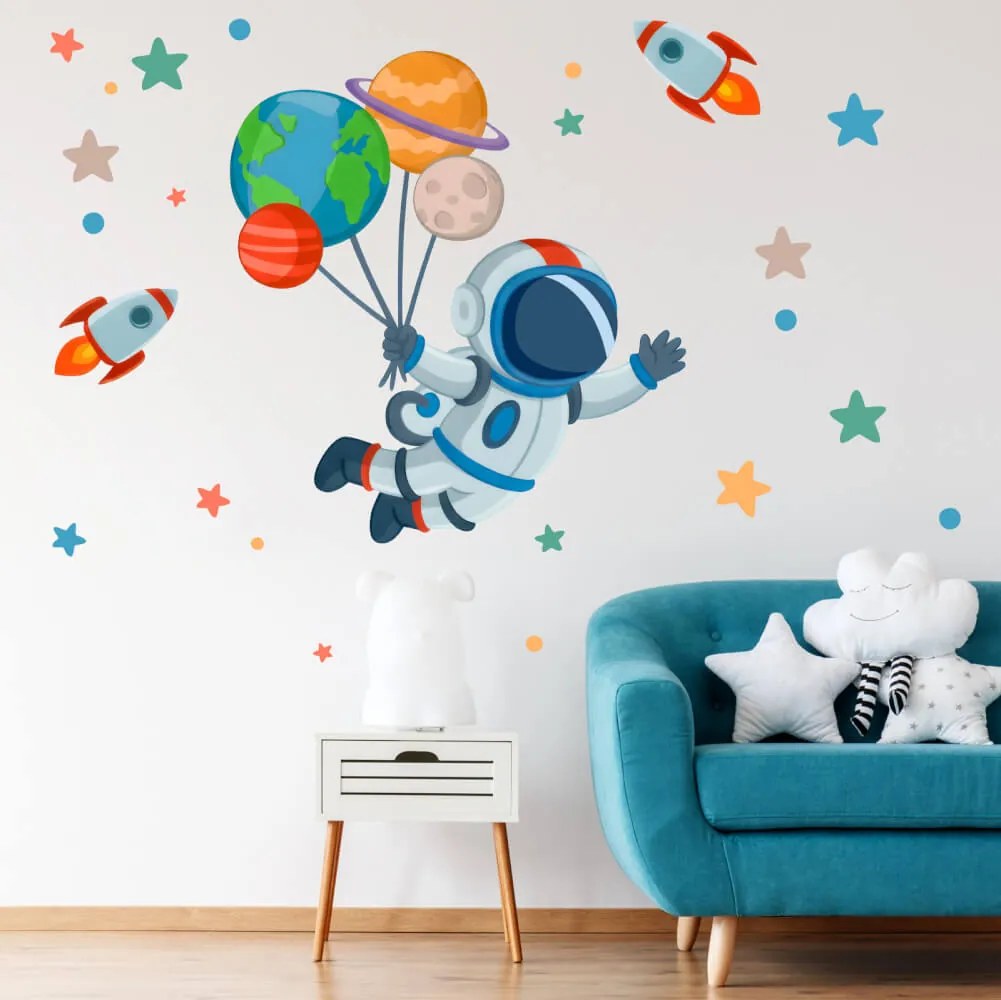 Autocolante de parede para quarto de criança – Astronauta com planetas