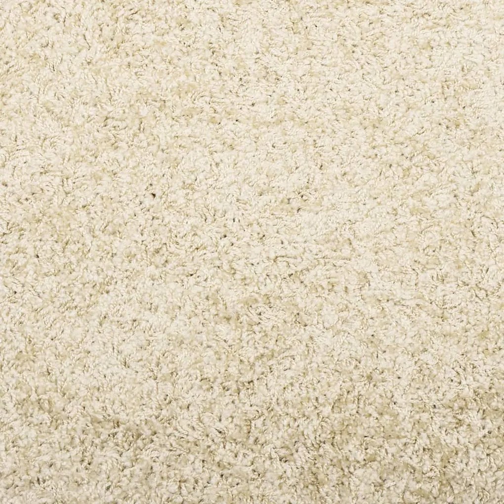 Tapete shaggy de pelo alto PAMPLONA Ø 120 cm dourado