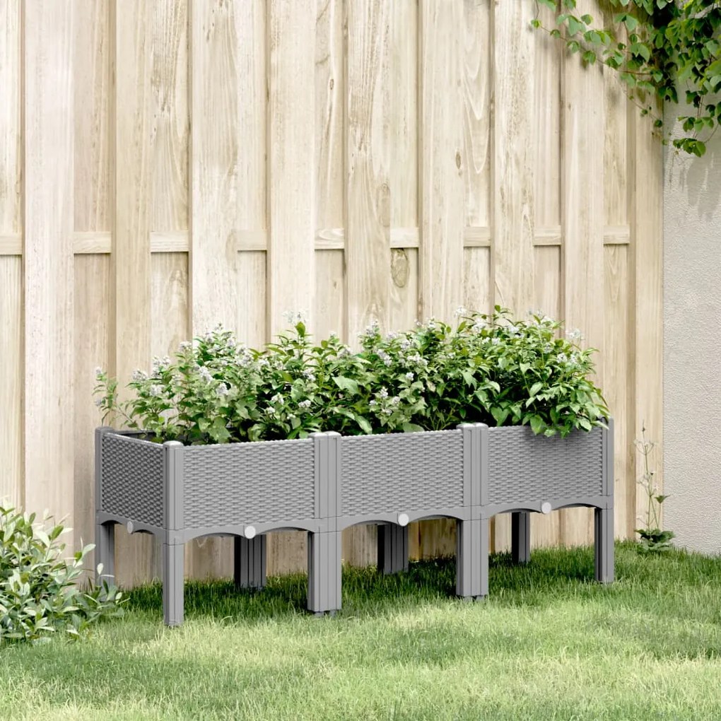 vidaXL Vaso/floreira de jardim c/ pernas 120x40x42cm PP cinzento-claro