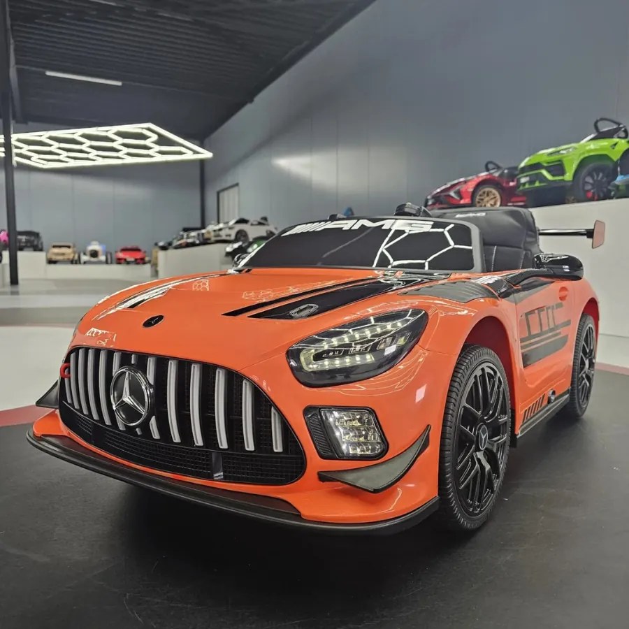 Carro elétrico infantil Mercedes GT3 AMG 12V Com pneus de borracha e Assento em couro Laranja