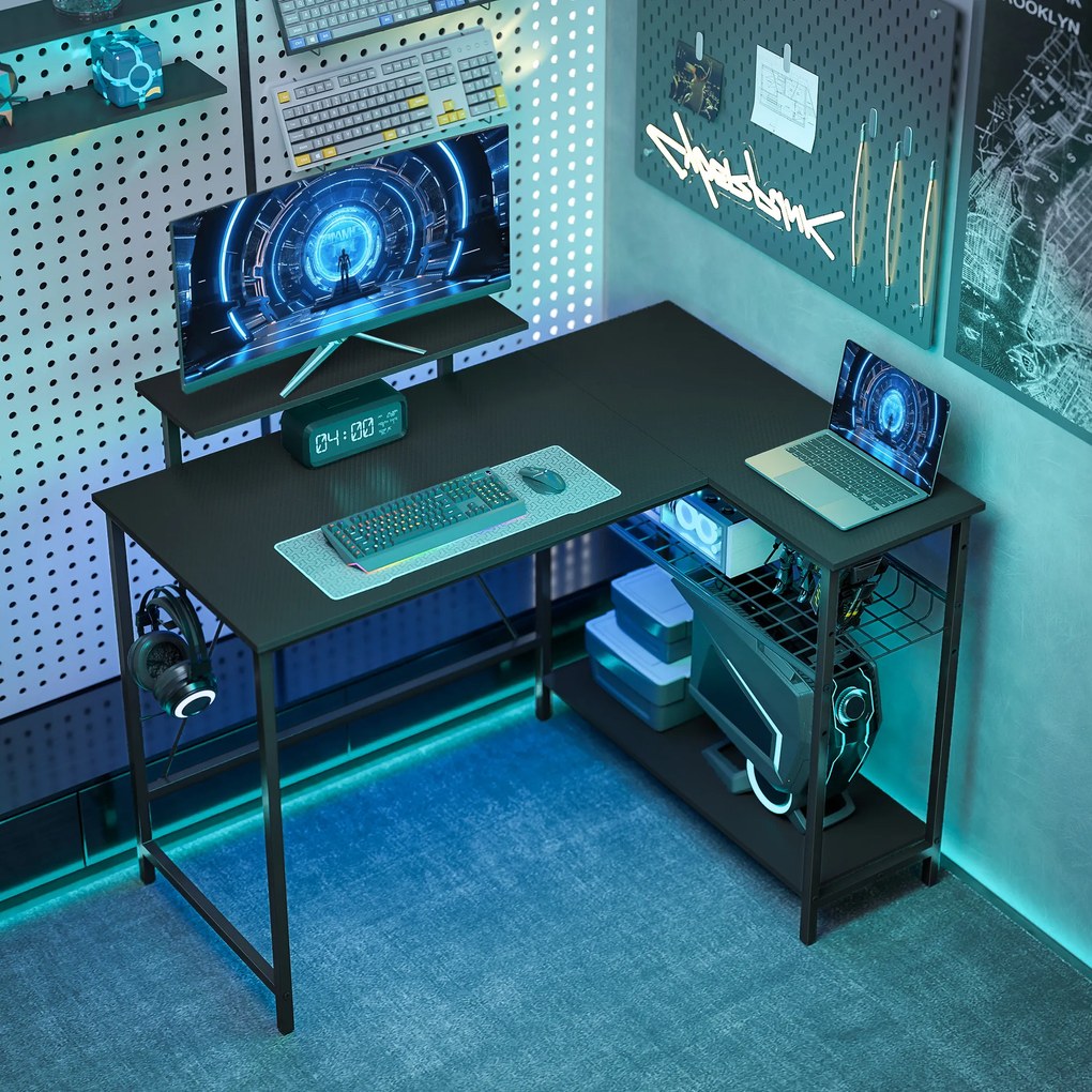 Secretária gaming reversível, 114,5 x 82 x 91,5 cm de canto, suporte para ecrã, prateleira em malha ajustável, preta