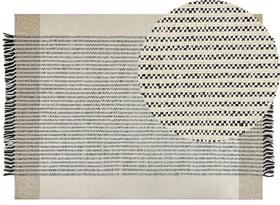 Tapete de lã creme e preta 140 x 200 cm DIVARLI Beliani