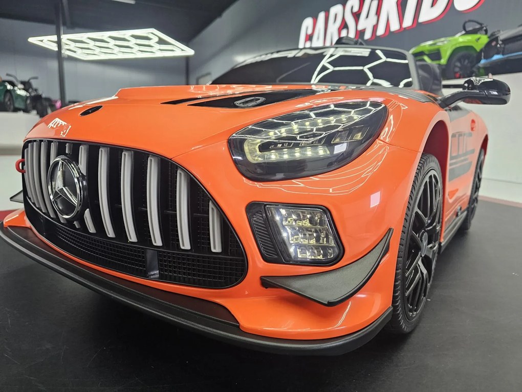 Carro elétrico infantil Mercedes GT3 AMG 12V Com pneus de borracha e Assento em couro Laranja