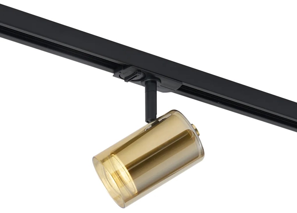 Foco moderno dourado com vidro âmbar para sistema de calhas monofásico - Iconic Lloyd