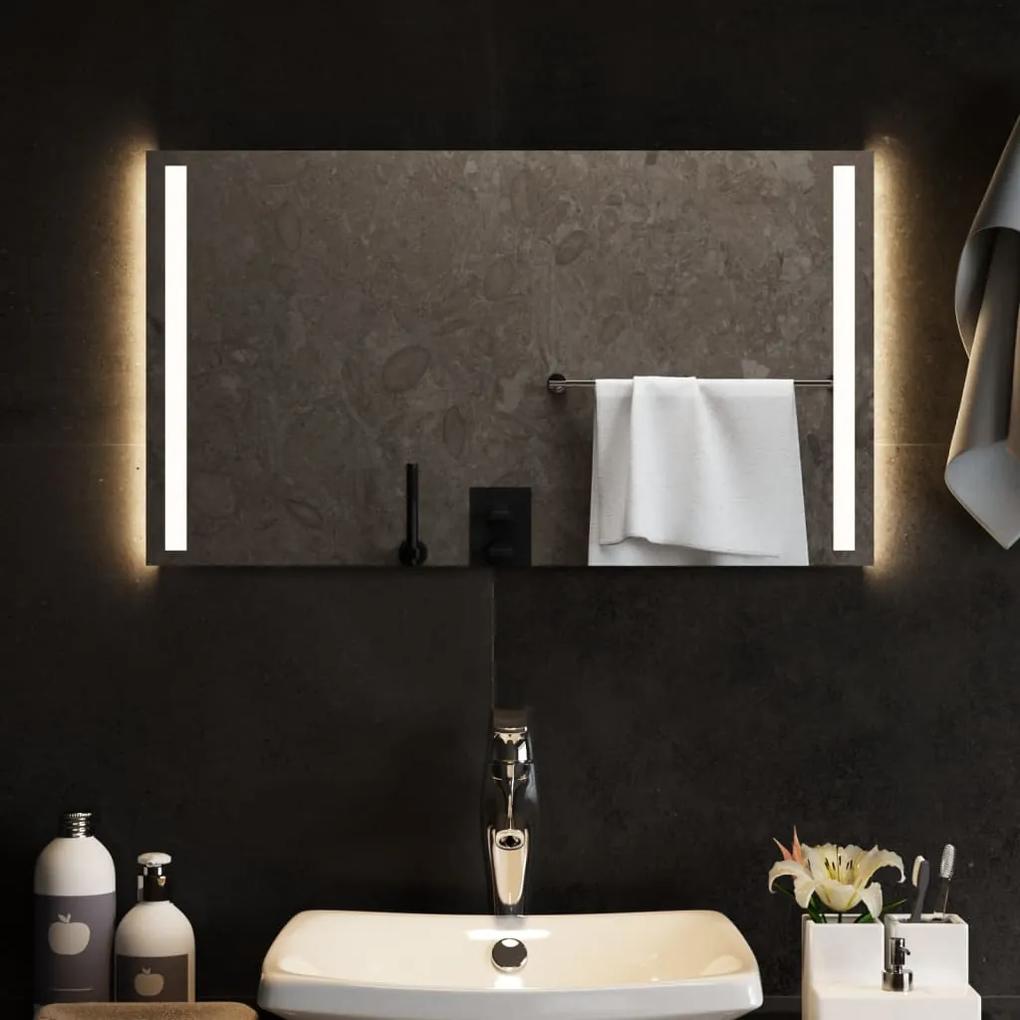 151745 vidaXL Espelho de casa de banho com luzes LED 70x40 cm