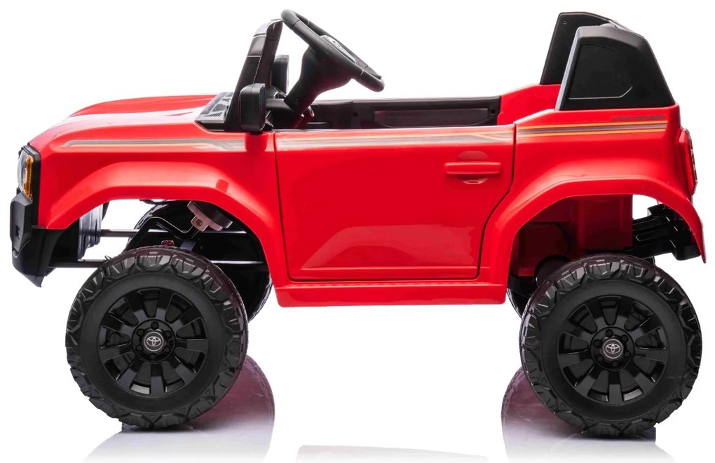 Jipe elétrico para crianças Toyota Landcruiser 12V controlo remoto de 2,4 GHz, entrada USB/AUX, Bluetooth, suspensão, bateria de lítio, luzes LED Verm