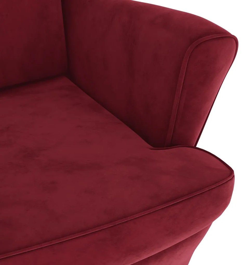 Poltrona em veludo vermelho tinto