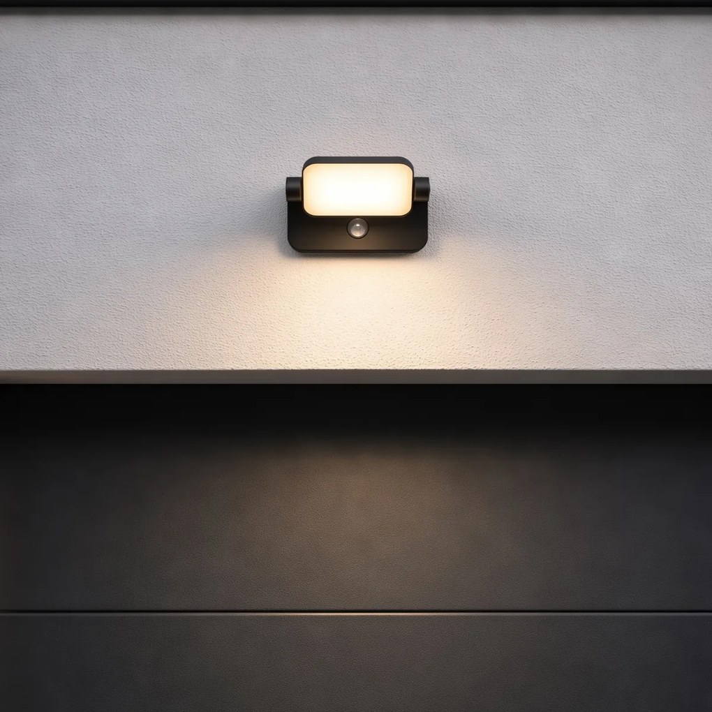 Candeeiro de parede exterior preto c/ LED ajustável e sensor de movimento - Kamile