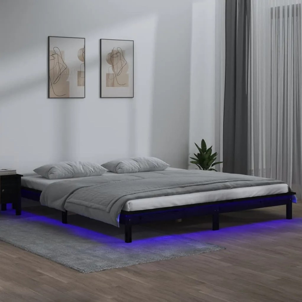 Estrutura de cama com LEDs 140x200 cm madeira maciça preto