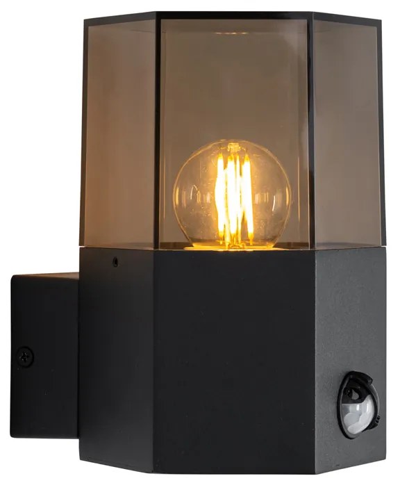 Candeeiro de parede exterior preto com vidro fumê hexagonal e sensor de movimento - Dinamarca Moderno