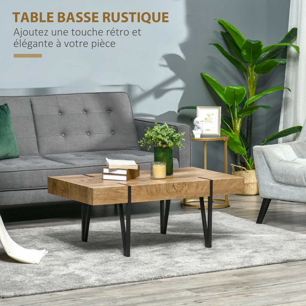 Mesa de centro retangular de estilo industrial, com pés em forma de alfinete de metal preto e tampo em madeira com aspeto envelhecido