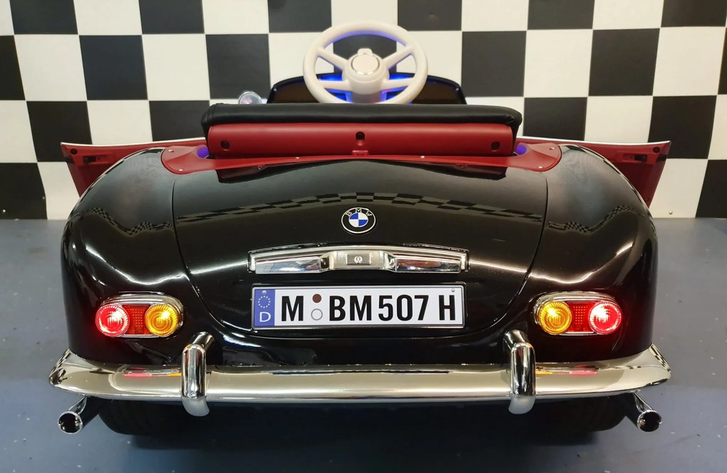 Carro elétrico infantil  para crianças 3 a 6 anos BMW 507 12 volts Pneus Borracha e controlo remoto 2.4G e arranque lento Preto