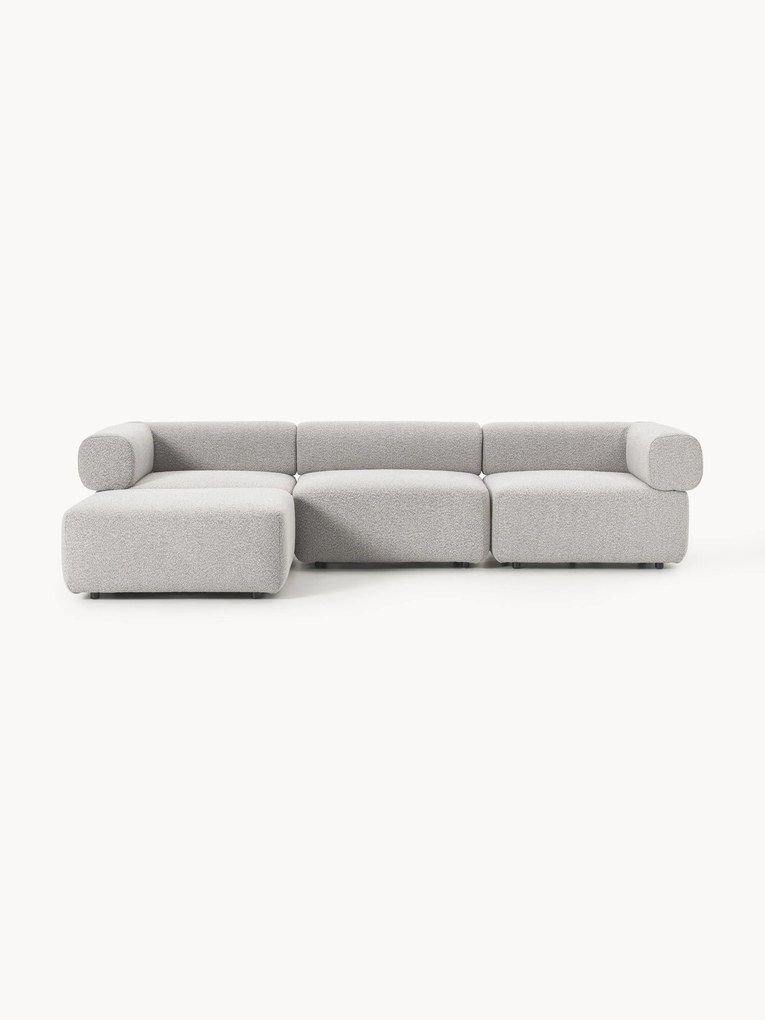 Sofá modular em bouclé Anton (4 lugares) com pufe (esquerdo/direito)
