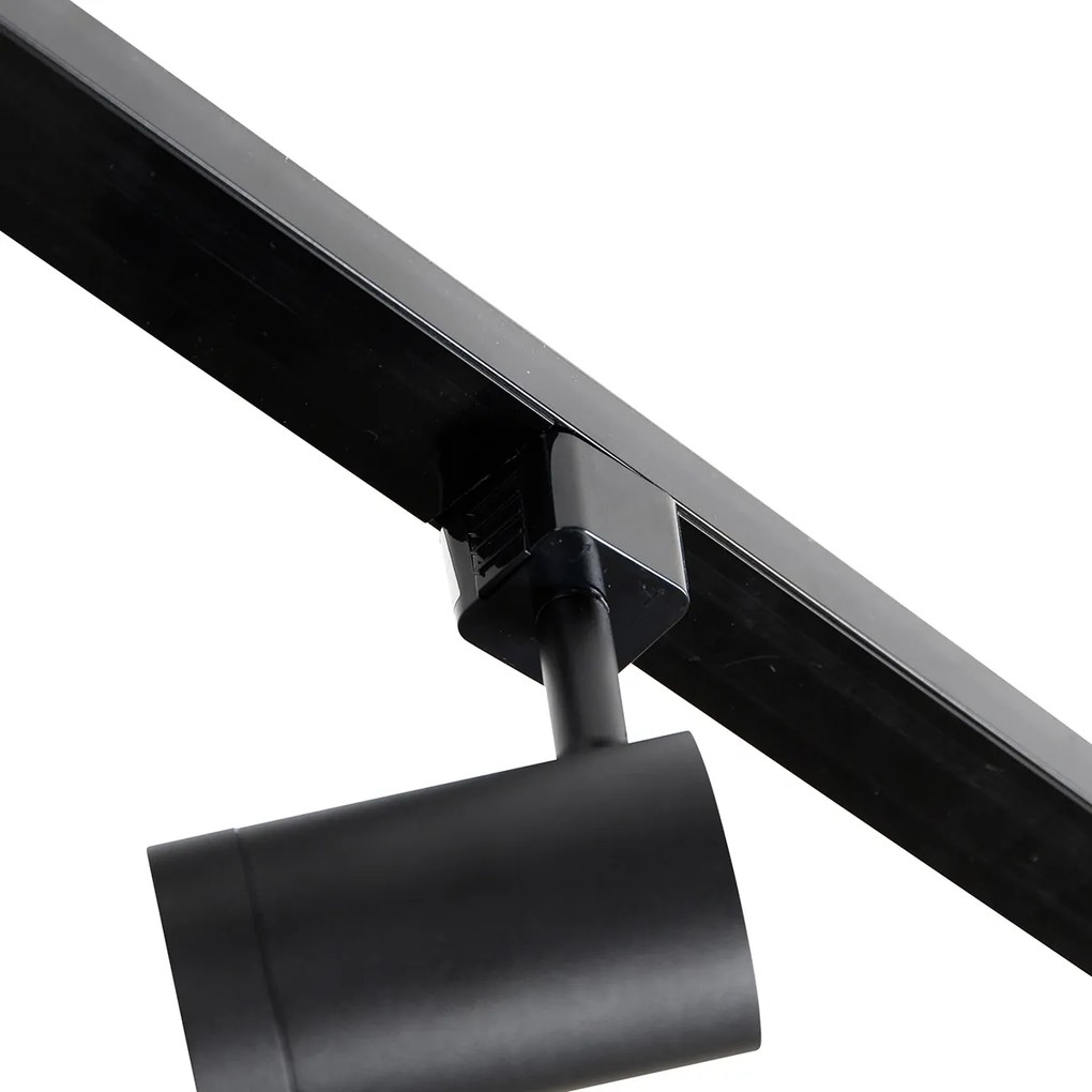 Sistema de trilhos monofásico preto com 4 focos e fonte de alimentação redonda I - Jeana Moderno