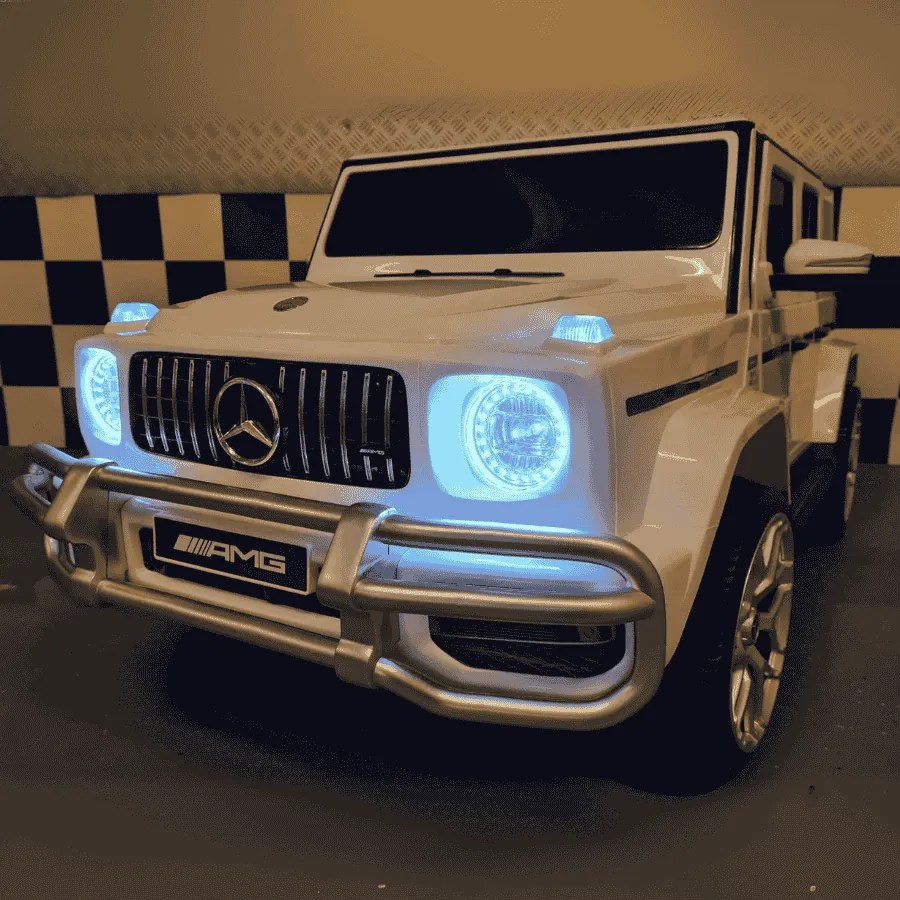 Carro infantil a bateria Mercedes G63 2 lugares 12V, Pneus Borracha, Assento couro branco