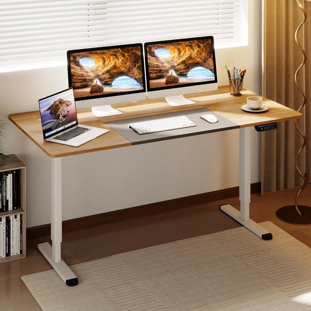 Secretária elétrica 140 x 70 cm com altura ajustável, memória de 4 posições, orifício para cabos e motor silencioso natural.