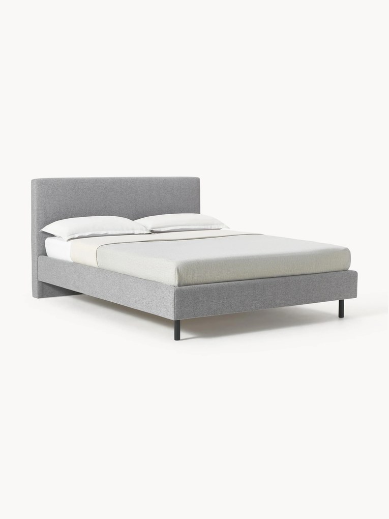 Cama estofada com pés em madeira Giulia