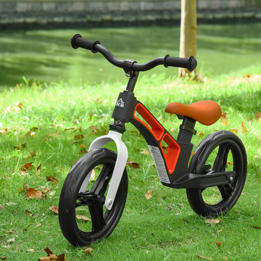 HOMCOM Bicicleta sem Pedais para Crianças de 2 a 5 anos Bicicleta de Equilibrio Infantil com Assento e Guidão Ajustáveis Rodas de Borracha 86x41x49-56cm Preto