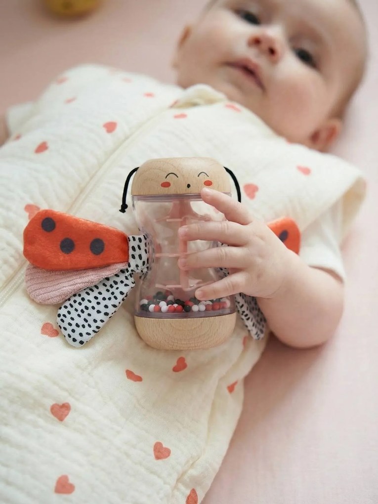 Chocalho de madeira com joaninha vermelho