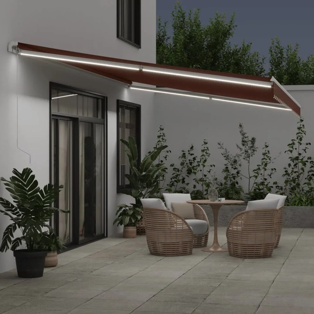 Toldo retrátil manual com luz LED 600x350 cm castanho