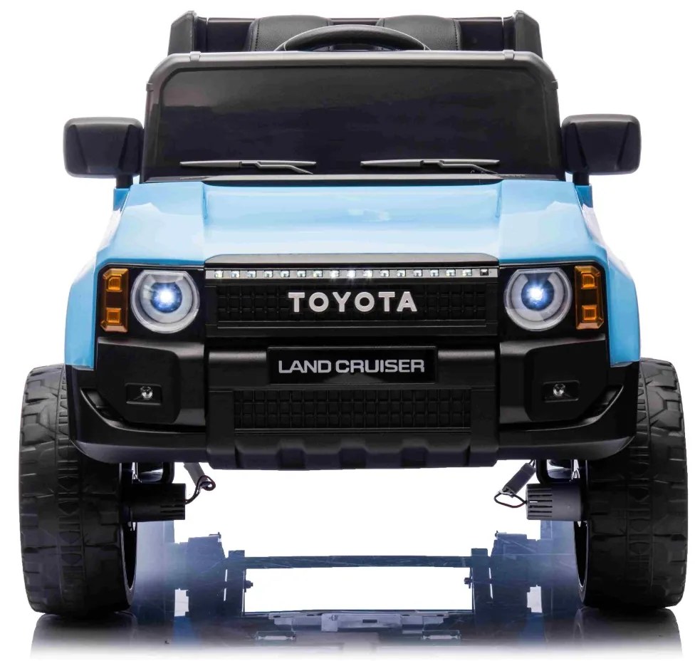Jipe elétrico para crianças Toyota Landcruiser 12V controlo remoto de 2,4 GHz, entrada USB/AUX, Bluetooth, suspensão, bateria de lítio, luzes LED Azul