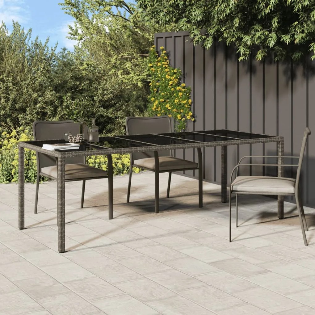vidaXL Mesa de jardim 250x100x75 cm vidro temperado e vime PE cinzento