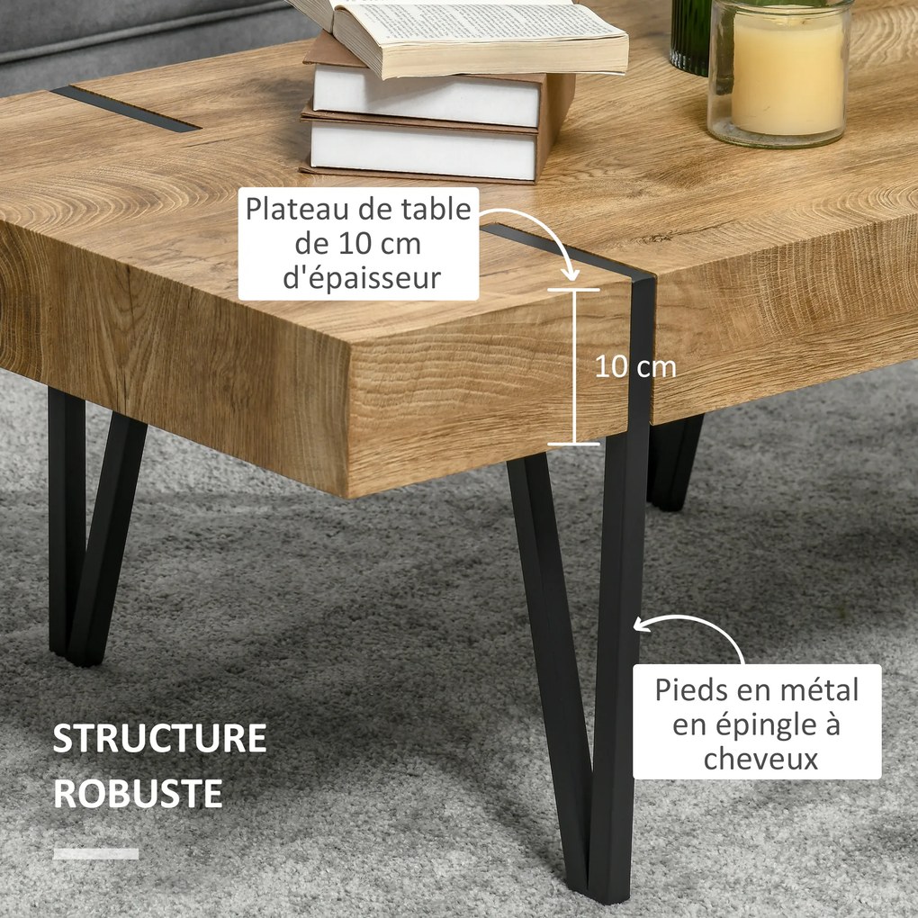 Mesa de centro retangular de estilo industrial, com pés em forma de alfinete de metal preto e tampo em madeira com aspeto envelhecido