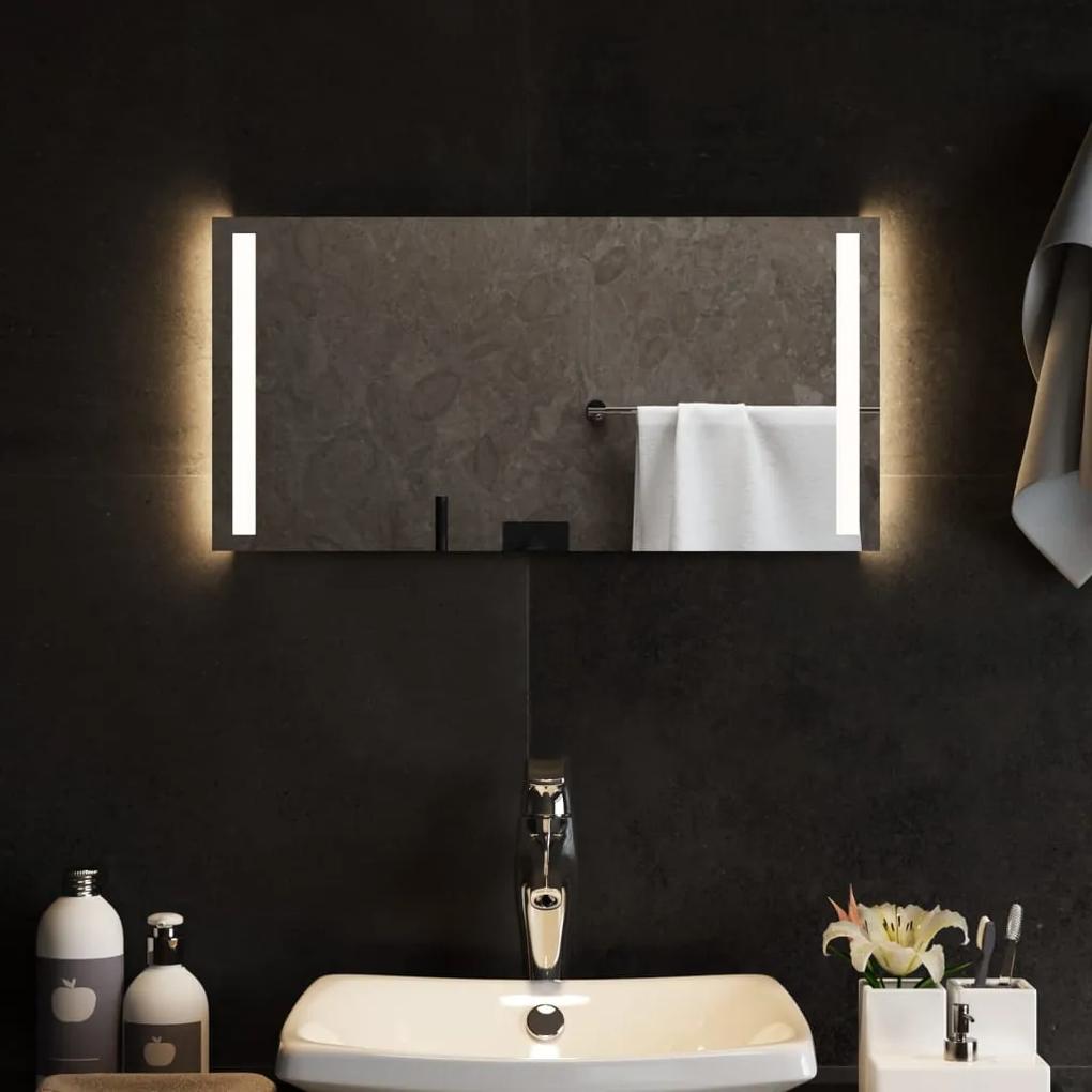 151743 vidaXL Espelho de casa de banho com luzes LED 60x30 cm