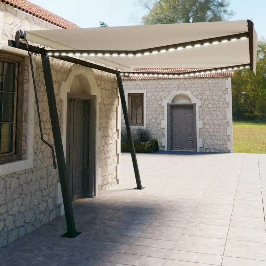 vidaXL Toldo retrátil manual com luzes LED 4,5x3 m cor creme