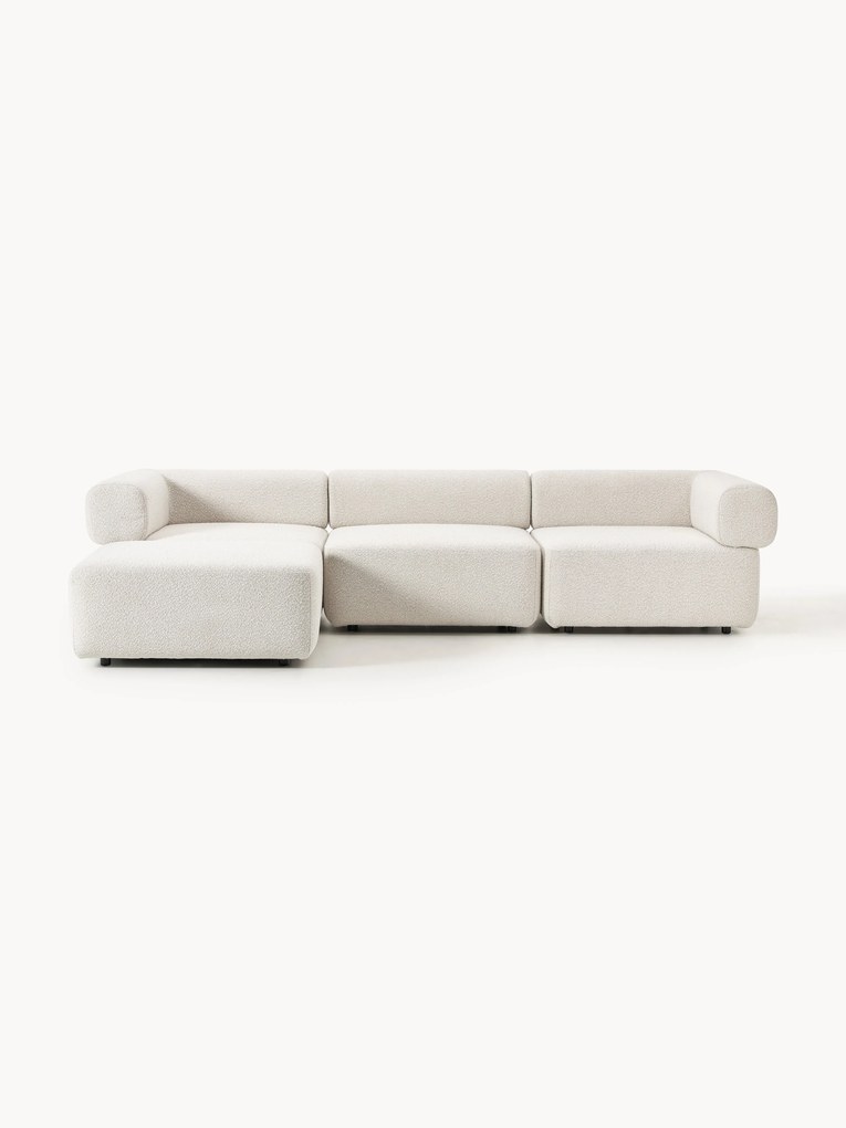 Sofá modular em bouclé Anton (4 lugares) com pufe (esquerdo/direito)