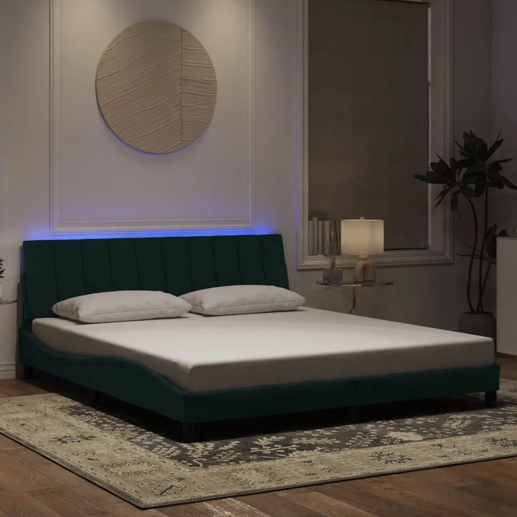 Estrutura de cama c/ luzes LED 180x200 cm veludo verde-escuro