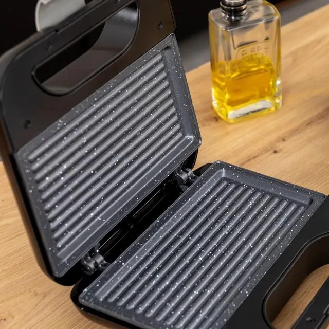 Tostadeira Rock'nToast Grill + com acabamentos em aço inoxidável e 800 W de potência