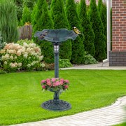 Fonte para pássaros com luz solar verde