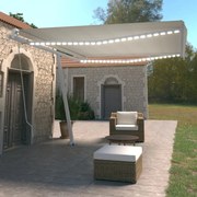 vidaXL Toldo retrátil manual com LED 450x350 cm cor creme