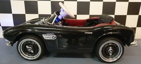 Carro elétrico infantil  para crianças 3 a 6 anos BMW 507 12 volts Pneus Borracha e controlo remoto 2.4G e arranque lento Preto