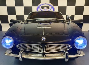 Carro elétrico infantil  para crianças 3 a 6 anos BMW 507 12 volts Pneus Borracha e controlo remoto 2.4G e arranque lento Preto