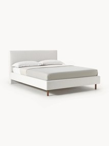 Cama estofada com pés em madeira Giulia