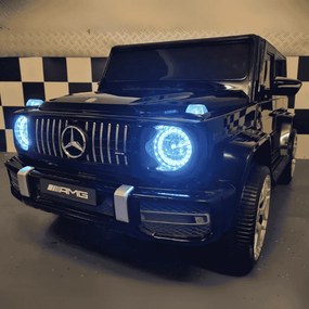 Carro Infantil Mercedes G63 2 lugares 12V,Pneus	Borracha, Assento de couro  preto metálico