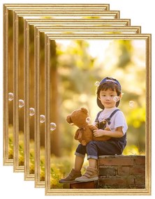 vidaXL Molduras para parede 5 pcs 50x70 cm MDF dourado