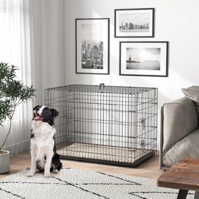 Gaiola de transporte dobrável para cães com pega, tabuleiro removível e almofada incluída – 105 x 70 x 75 cm – preta