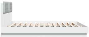 Estrutura de cama com cabeceira e luzes LED 180x200 cm branco