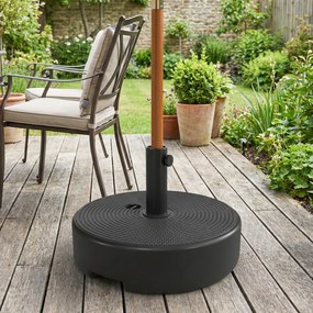 Base para guarda-sol Ø 45 x 30,5 cm de exterior. Pode ser enchida com até 19 kg de areia ou 15 kg de água, preta