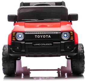 Jipe elétrico para crianças Toyota Landcruiser 12V controlo remoto de 2,4 GHz, entrada USB/AUX, Bluetooth, suspensão, bateria de lítio, luzes LED Verm