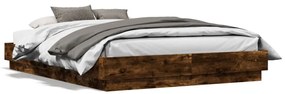 Estrutura de cama com luzes LED 140x190 cm carvalho fumado