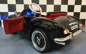 Carro elétrico infantil  para crianças 3 a 6 anos BMW 507 12 volts Pneus Borracha e controlo remoto 2.4G e arranque lento Preto
